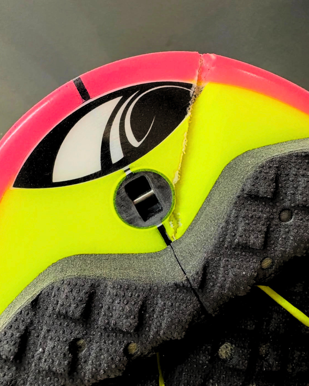Close-up of a surfboard repair in progress